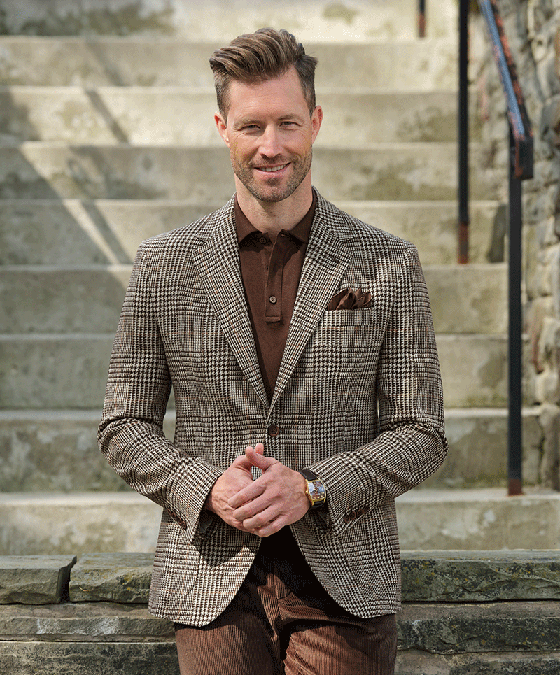 Man wearing brown plaid sport coat (cloth 27520) in 100% Italian wool paired with corduroy trousers (cloth 69804)