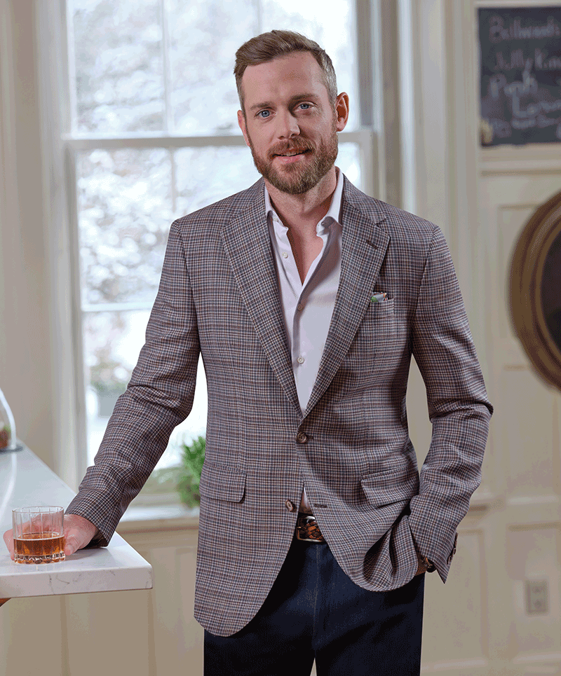Man wearing Wine, teal and light blue plaid Super 130’s Italian wool sport coat, cloth 27067.
Paired with denim pants, cloth 55391.