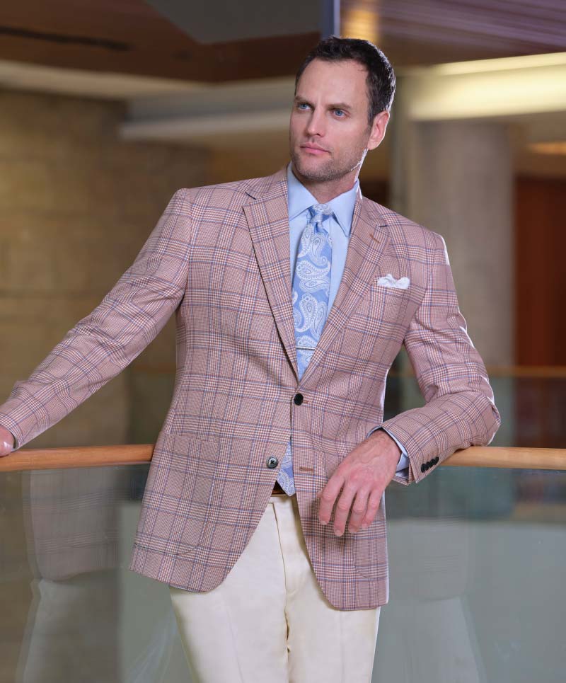Super 130’s ginger plaid with blue window pane sport coat (Cloth #27954)
paired with 100% wool cream trousers ( cloth# 9645) Fabric woven in Italy.